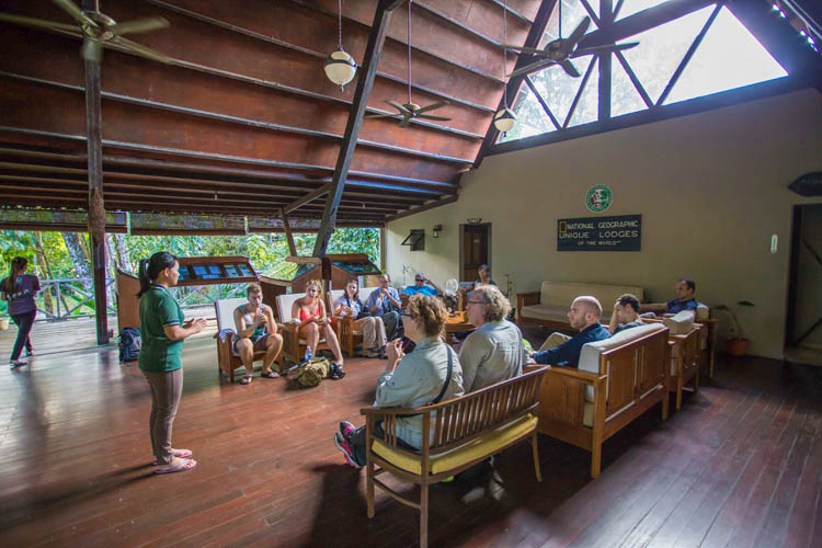 Tourists listening to briefing made by a staff from Sukau Rainforest Lodge